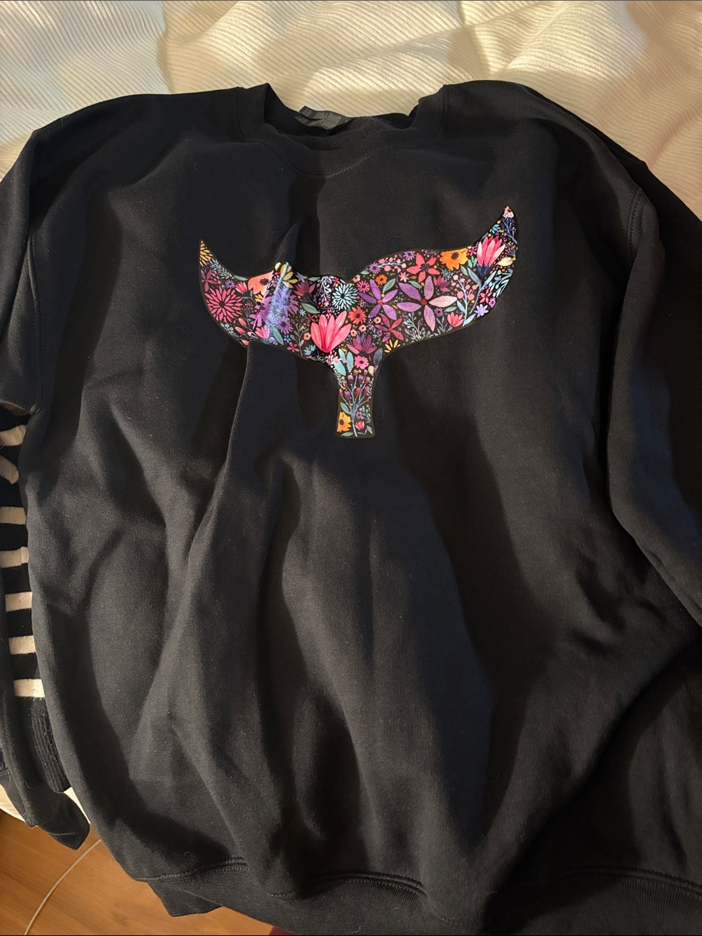 Black Crewneck Sweatshirt with Colorful Floral Whale Tail Graphic